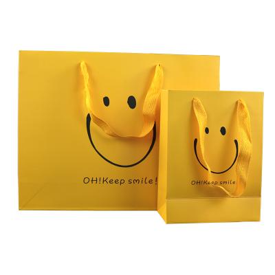 China Wholesale Custom Luxury Gift Art Paper High Quality Clothing Shopping Packaging Paper Bags Recyclable for sale