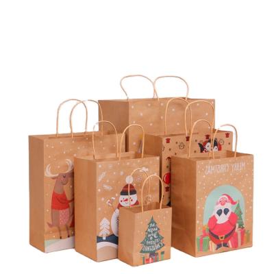 China Hot Selling High Quality Recycled Christmas Theme Kraft Paper Gift Wrapping Paper Bag Multi-Spec. of materials for sale