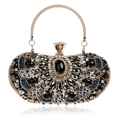 China Grasp Crystal Clotch Bag Women Metal Purse Women Handbag Evening Clutch Shiny Elegant Wedding Party Purse for sale