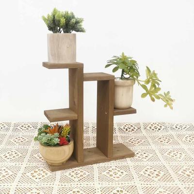 China Modern Whiskey Flower Rack Display Stand Centerpiece Wooden Flower Pot Holder for sale