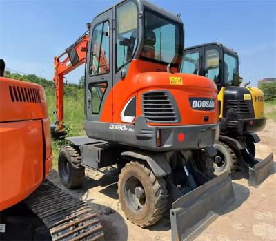 China Low Price 4265mm Dumping Height  Second Hand Orange  Doosan DX60W Wheeled  Excavator for sale