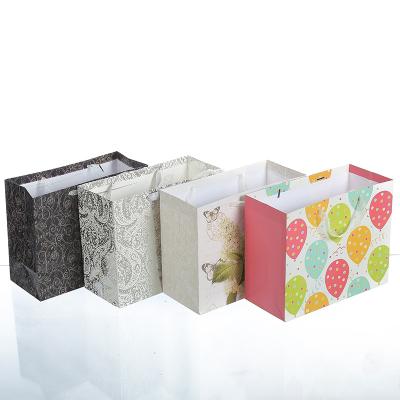 China Recycled Materials Customize Design Kraft Fancy Shopping Paper Bag Printing Gift Custom OEM Craft Gsm Item Time Industrial Surface Packaging Pcs for sale