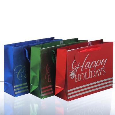 China Recycled Materials Laser holographic  gift greeting Shopping Paper Bag for sale