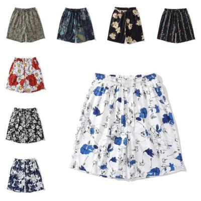 China Floral Beach Vacation Anti-wrinkle Summer Trend Hawaii Shorts Men's Casual Loose Five-Point Pants for sale