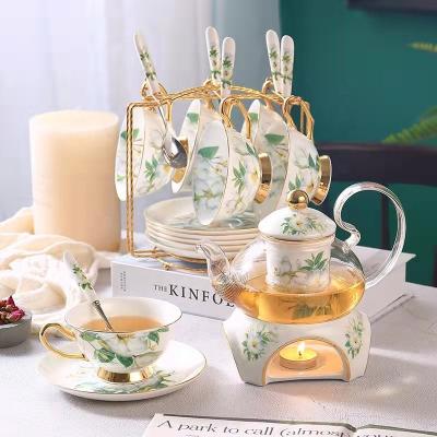 China Viable Flower Glass Tea Set Teapot Afternoon Tea Coffee Boiled English Tea Cup With Candle Warmer Base for sale