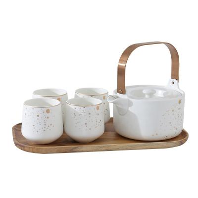 China Sustainable Modern Ceramic Coffee Mug Set White Tea Cup Set With Wooden Teapot Tray 4 Tea Cup Gift Box for sale