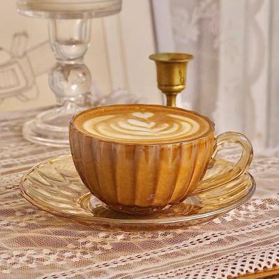 China Sustainable Pumpkin Shape Transparent Glass Cups Saucers Drinkware Afternoon Tea Coffee Cups Set With Gold Rims for sale