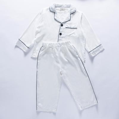 China Casual Hot Sale Cotton Lapel Two Piece Pajamas Sets For Kids With Long Sleeve And Pockets for sale