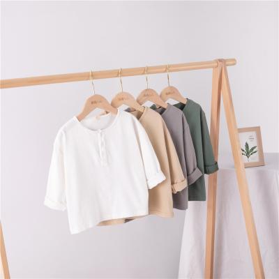 China Fashionable Kids Clothing Boys And Girls Cotton Solid Color Breathable Long Sleeve T-Shirt for sale