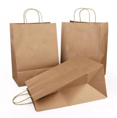 China Recycled Materials Customized Logo Recyclable Brown Kraft Paper Bag With Handles For Packaging for sale