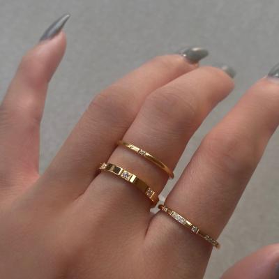 China Dazan 18k Gold Stainless Steel Zircon Wedding Designer Simple Wholesale Stacked Trendy New 2021 Custom Rings For Women For Men for sale