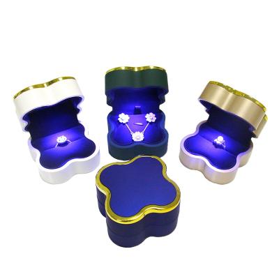 China Wholesale Handmade Plastic Velvet Wedding Jewelry Box Shape Ring Flower Jewelry Box LED Jewelry Box for sale