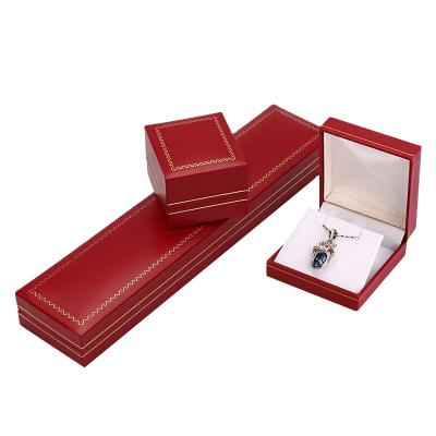 China Handcrafted Luxury Logo Ring Bracelet Necklace Gift Jewelry Box Plastic Wholesale Custom Jewelry Packaging Box for sale