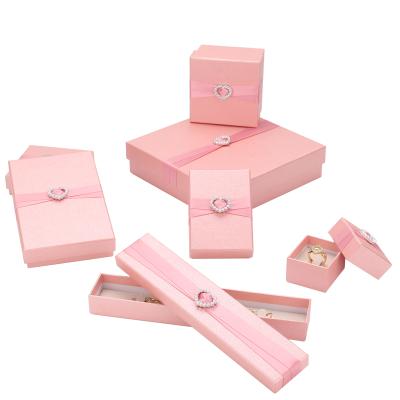 China Custom Hand Made Logo Ribbon Closure Jewelry Gift Packaging Paper Box With Beigr Foam Insert for sale