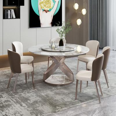 China Hot Sale Convertible Nordic Luxury Home New Product Large Capacity Round Dining Table,Modern Rock Panel Lightweight Luxury Dining Table for sale