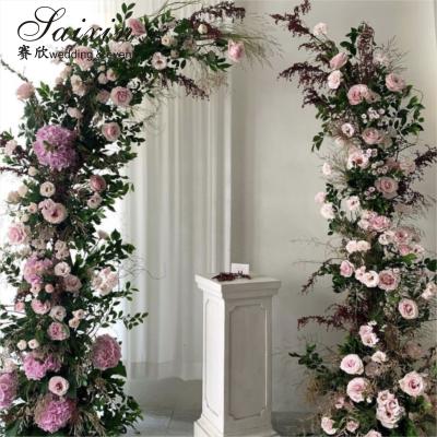 China Wedding Backdrop Arch Sheep Horn Door Flower Arrangement Stand Metal Wedding Decoration Backdrop Arch for sale