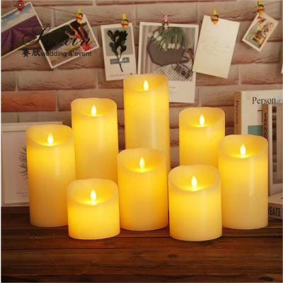 China Good quality event decoration real wax dripping dancing flame LED pillar candle zu verkaufen