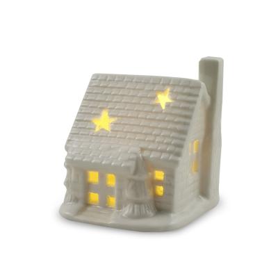 China Christmas Home Table Decoration Customized Ceramic Christmas House With LED Light Wholesale White Porcelain Handmade Headlamp for sale