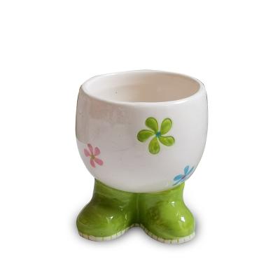 China Viable Dolomite Easter Egg Cup Ceramic Handpainting Egg Holder Hard Feeted Egg Cup for sale