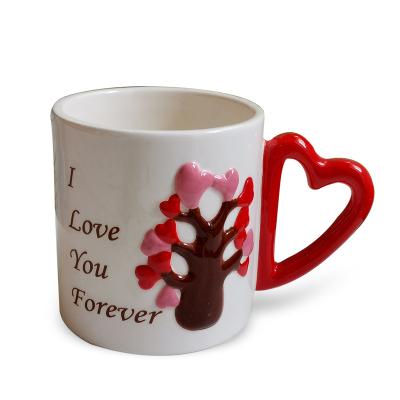 China Viable Design Valentine Coffee Mug Ceramic Love Tree Valentine Embossed Mug Handpainting With for sale