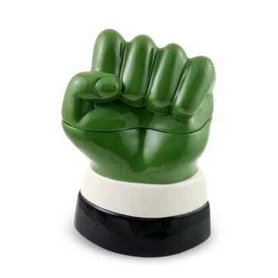 China Food Grade Ceramic Cookie Jar In Fist Shape Wholesale Dolomite Fist Shape Storage Jar Handpainting Canister for sale