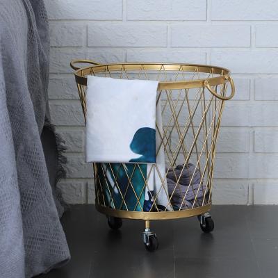 China Modern light luxury gold laundry basket metal bathroom storage cabinet sucia sale de cesto de ropa for sale