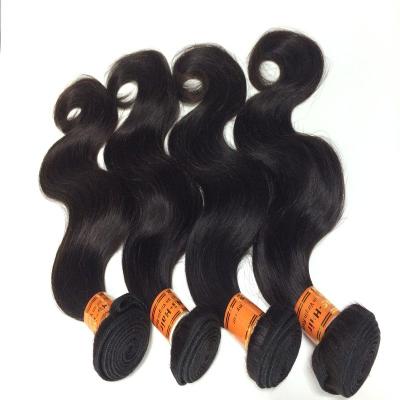 China Hot Selling 100% Human Hair Extensions Natural Black  Brazilian Virgin Hair Body Wave With 4*4Inch Free Part  Closures for sale