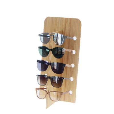 China OEM Quality Retail Bamboo Chain Store Glass Display Rack Sunglass Wooden Display Stand for sale