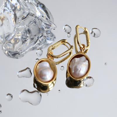 China CLASSIC Oval Pendant Baroque Special Shaped Pearl Earrings For Women With Simple Cold Air Metal Stud Earrings for sale