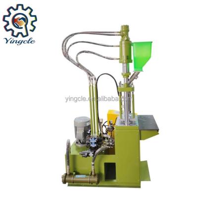 China Yingcle Vertical Two Color Vertical Type Automatic Plastic Injection Molding Machine for sale