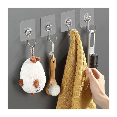 China Plastic Stocked Non-Trace Wall Hanging Hook For Organization Wall Key Hook For Ball And Small Items Clear Adhesive Hook for sale