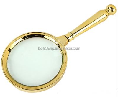 China Plastic Glass Gold Coating Hand Grip Magnifier With 5x Glass for sale