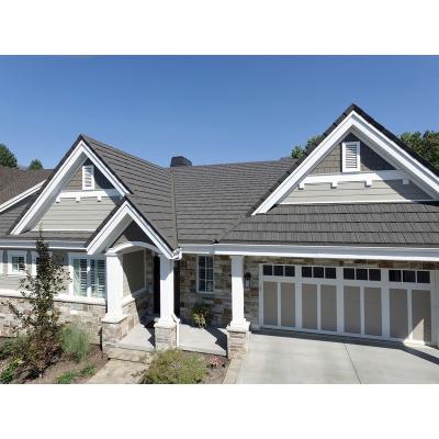 China Fireproof Ghana Colored Galvanized Stone Coated Steel Roof Tiles Roofing Shingle For Modern House Design for sale