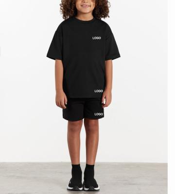 China Kids Casual Boys Oversized T-shirt And Shorts Sets Fashion Pattern Print Black Letter Short Sleeve Tee Tops And Shorts 2 Piece Set for sale