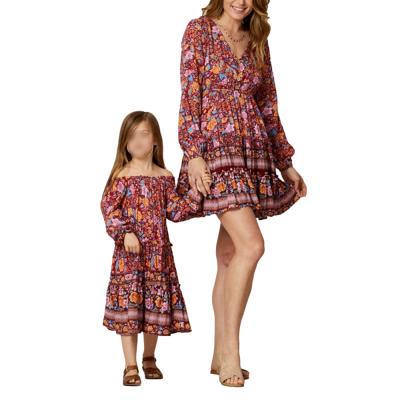 China Mommy and Me QUICK DRY floral dress swing line casual long v-neckline A-line dresses with matching button front family outfits for sale