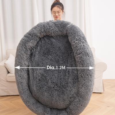 China Luxury Soft Fur Cat Bed House Fluffy Plush Cat Round Bed Pet Calming Cat Bed from Travel Faux for sale