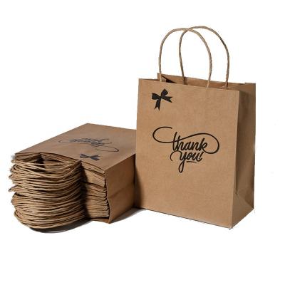 China Handmade Brown Kraft Paper Mailing Bags Thank You Gift Bags With Handle For Retail Shopping for sale