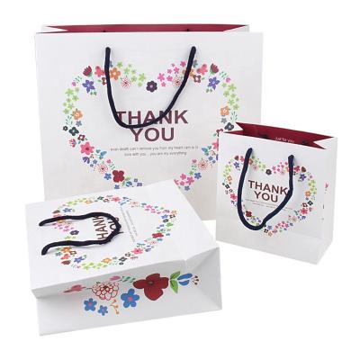 China Paper Bag Handmade Floral Shopping Bag Thank You Business Shopping Bags With Handle for sale