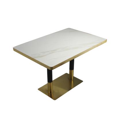 China New Design Modern Rock Slab Metal Frame Top Dining Table for sale