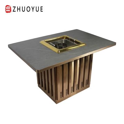 China Modern Commercial Rock Dish Restaurant Hotpot Restaurant Table Smokeless Equipment for sale