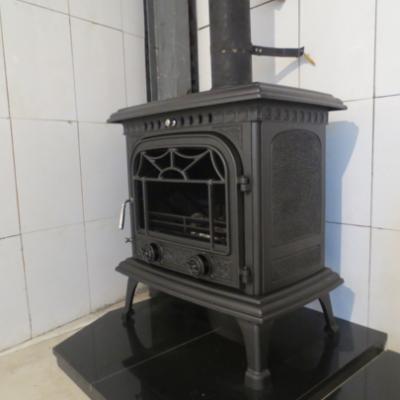 China Chinese high output wood stove/popular cast iron stove/new design wood burning stove for sale