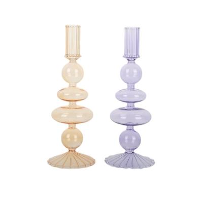 China Modern Art Unique Long-Stem Glass Tealight Candleholders Colored Luxury Candlestick Holder With Glass for sale