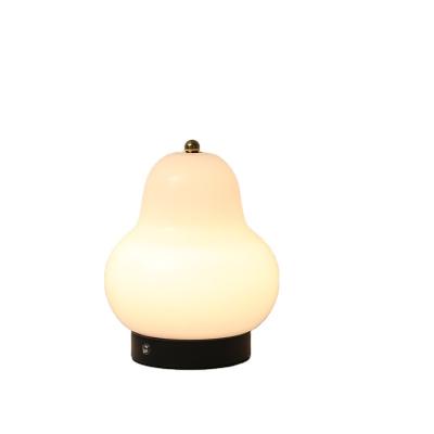 China Modern Factory Price Cream Pear Table Lamp Atmosphere Touch Portable Warm Color Table Lamp For Girl'S Gift for sale