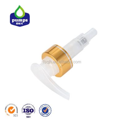 China Non Spill White Plastic Liquid Lotion Pump Gold Collar Lotion Pump Head for sale