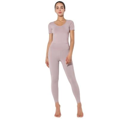 China 2021 High Quality Custom Seamless Yoga Workout Active Women Sports Fitness Yoga Set Breathable Sets With Pocket for sale