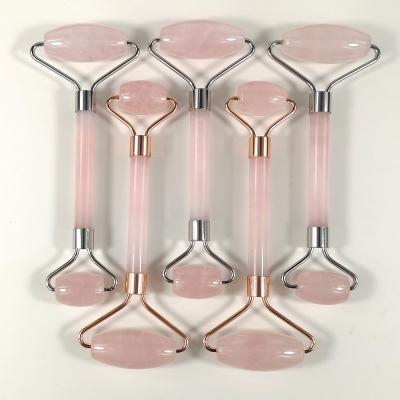 China New Welded Frame with Shiny Color and Antioxidant Frame 100% Natural Rose Quartz Stone Silver Metal Welded Rose Quartz Facial Roller Jade Roller for sale