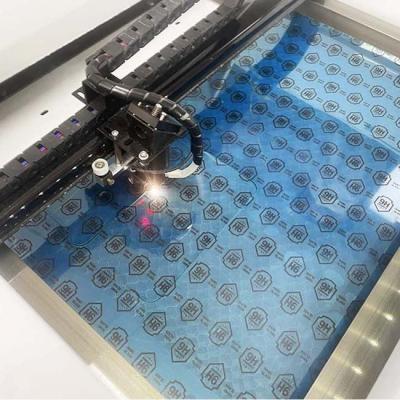 China 700w Daqin Screen Protector Laser Cutting Machine For Mobile Phone 3d Tempered Glass for sale