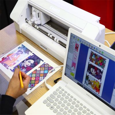 China Vinyl Sticker Mobile Skin Cutting Machine Plotter Custom With Skin Design Software for sale