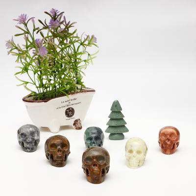 China Red Crystal Skulls Head For Fengshui Home Decoration Geo Agate Carnelian Stones Wholesale Euro American National Natural Quartz Skulls for sale