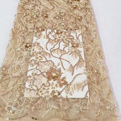 China Breathable top end plant and flower design light champagne sequin embroidery beaded lace fabric for evening dress for sale